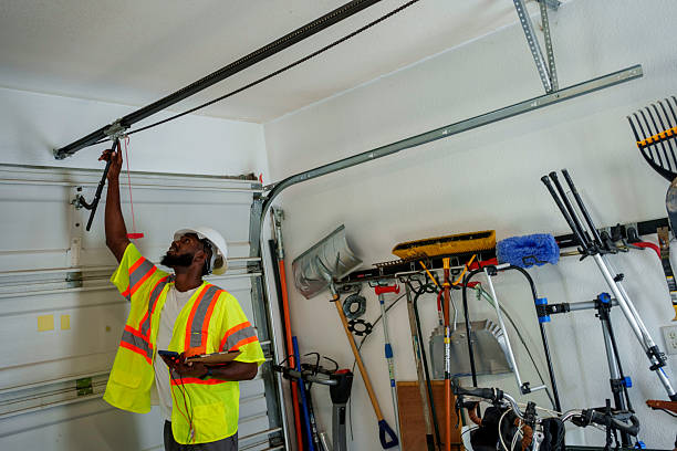 Professional Garage Door Panel Replacement technician working in East Bakersfield, CA